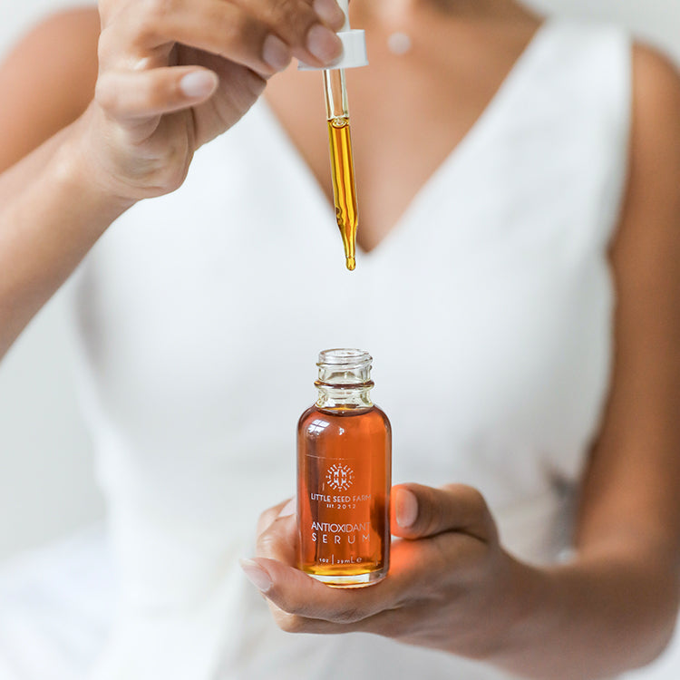 Little Seed Farm | Antioxidant Serum bottle featuring a blend of botanical oils and CoQ10, designed to protect and revitalize skin against environmental stressors.