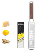 Microplane | Master Series Zester with Walnut Handle, showcasing packaging and uses with lemon, ginger, and cheese, ideal for precise zesting in culinary tasks.