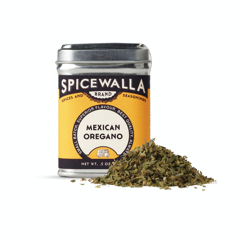 Spicewalla | Mexican Oregano tin beside dried oregano leaves, ideal for enhancing Greek and Mexican dishes, complements Athens Cooks' specialty food offerings.