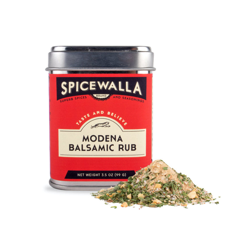 Spicewalla | Modena Balsamic Rub tin with a small pile of balsamic-flavored seasoning blend in front, highlighting its tangy and rich culinary use.
