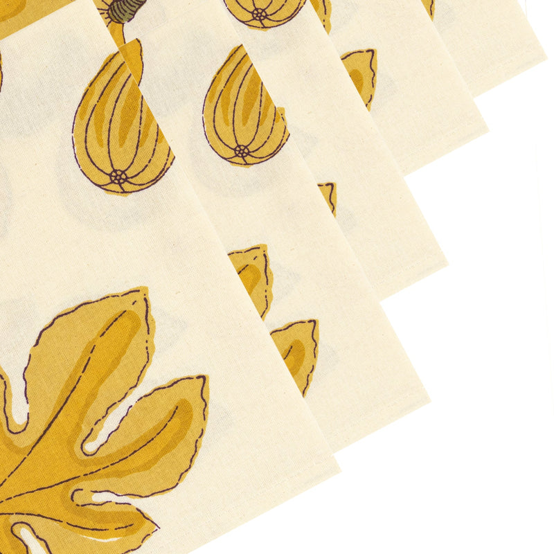 Set of six 19 x 19 Fig Citrine Napkins from Caravan Home, featuring handprinted citrine figs and leaves on French linen, ideal for elegant table settings.