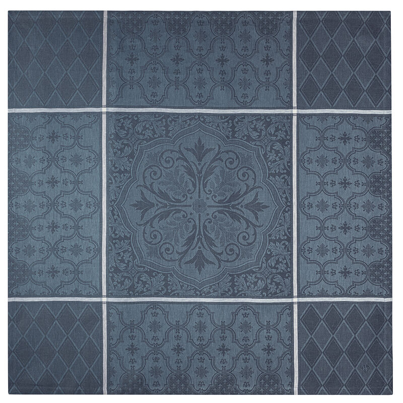 Le Jacquard Francais | Armoiries Tablecloth, Blue, 69 x 98, features a vintage-inspired, decorative 3×3 grid design with a central mandala and alternating lattice patterns.