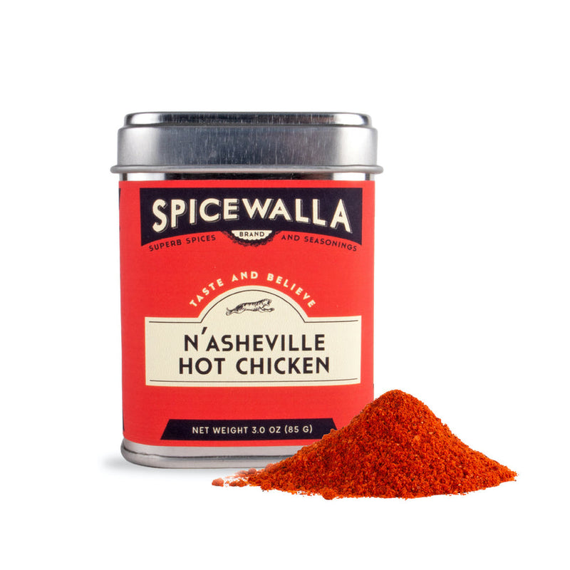 Spicewalla | N'Asheville Hot Chicken spice tin with a mound of red-orange seasoning, perfect for adding a spicy kick to your dishes.