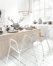 MagicLinen's 59 x 98-inch linen tablecloth with simple seam finish, perfect for enhancing any dining setting with contemporary elegance.