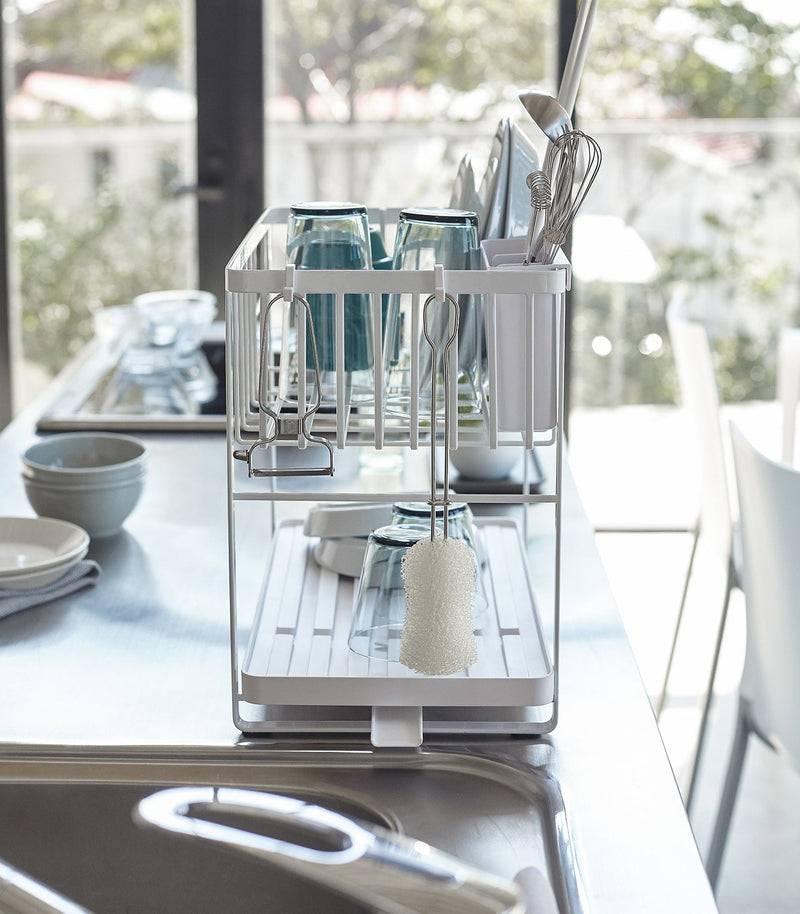 Yamazaki Home | Two-Tier Dish Rack, White, maximizes drying space with customizable tiers and utensil holder, perfect for organized, efficient kitchens.