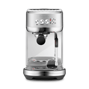 Breville | Bambino Plus, Brushed Stainless Steel: Semi-automatic espresso machine with portafilter, control knobs, steam wand, and drip tray, ideal for home coffee brewing.