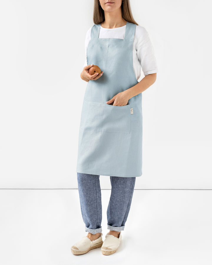 MagicLinen Pinafore Cross-Back Linen Apron, S-M, featuring criss-cross straps and side pockets for practical cooking or gardening use.