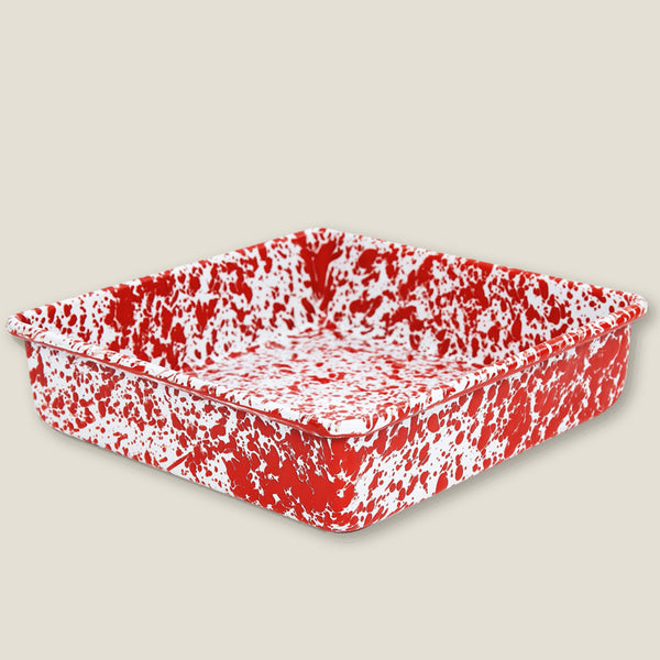 Crow Canyon Home Splatter Enamelware Square Brownie Pan in red splatter design, ideal for stylish and practical kitchen storage solutions.