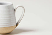 Farmhouse Pottery | Farmer's Pitchers - Medium features a hand-formed spout and sturdy handle, ideal for serving or displaying flowers, embodying rustic elegance.