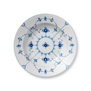 Royal Copenhagen | Blue Fluted Plain Plate Deep, 23cm: A porcelain plate with cobalt-blue floral and scroll pattern, fluted rim, perfect for elegant table settings.
