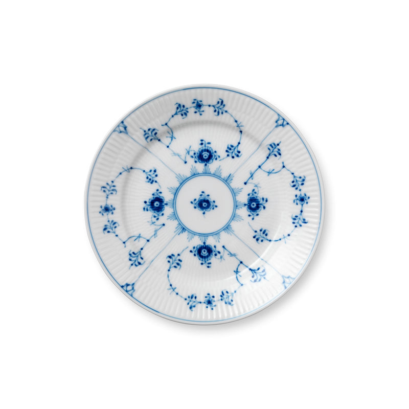 Royal Copenhagen | Blue Fluted Plain Plate, 19cm: A delicately fluted porcelain plate with intricate cobalt-blue floral patterns, ideal for elegant small dishes or lunch servings.