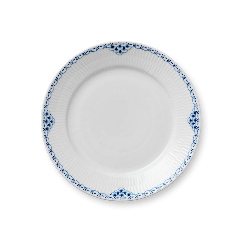 Royal Copenhagen | Princess Plate, 22cm: A round, white porcelain plate with a cobalt-blue scallop and dot band, featuring a subtle rib-patterned glaze.