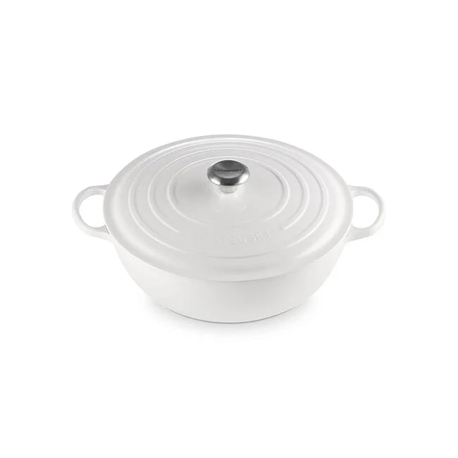 Le Creuset | Signature Chef's Oven: White enameled cast-iron Dutch oven with sloped sides, domed lid, and loop handles, ideal for versatile cooking and easy handling.