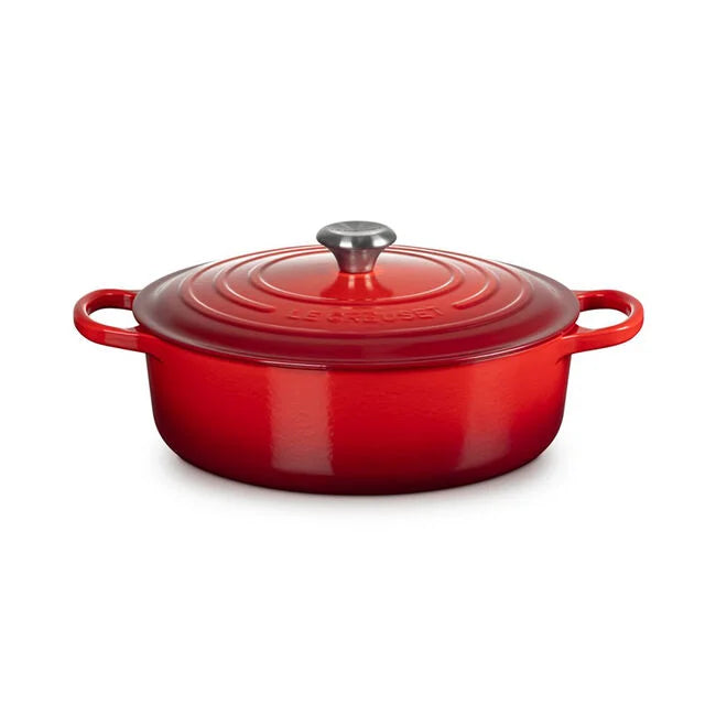 Le Creuset | Signature Round Wide Oven, Cerise, shown with matching lid and handles, ideal for versatile cooking and serving, reflecting Athens Cooks' curated kitchen essentials.