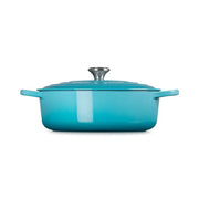 Le Creuset | Signature Round Wide Oven - Caribbean: Turquoise enameled cast-iron pot with lid and handles, ideal for versatile cooking and serving at Athens Cooks.