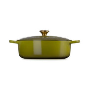 Le Creuset | Signature Round Wide Oven - Olive: Enameled cast-iron casserole with side handles and brass knob, ideal for versatile cooking, serving, and batch meal preparation.