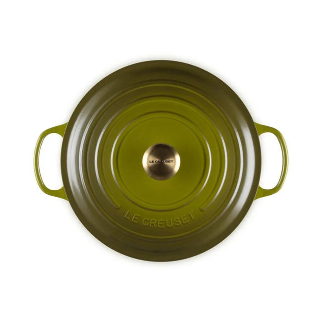 Le Creuset | Signature Round Wide Oven - Olive with embossed lid, ideal for versatile cooking from stove to table, showcased at Athens Cooks kitchen store.
