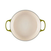 Le Creuset | Signature Round Wide Oven - Olive: Top-down view of an empty, enameled cast iron casserole with loop handles, ideal for versatile cooking and serving.