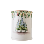 Arte Italica & Crown Linen Designs Natale Utensil Holder, a hand-painted ceramic vessel featuring holly garlands and evergreen trees, ideal for festive and winter kitchen decor.