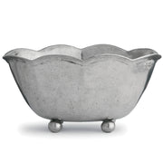 Arte Italica & Crown Linen Designs | Vintage Scalloped Bowl: A handcrafted Italian pewter bowl with scalloped rim and ball feet, ideal for condiments or decorative use.