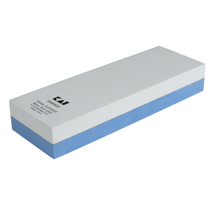 Shun Combination Whetstone & Rubber Base showing dual-grit surfaces for sharpening and polishing blades. Includes a stable rubber tray for effective use.