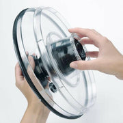 OXO Good Grips Salad Spinner with stainless steel bowl, featuring a non-slip knob, colander basket, and brake button for easy drying and serving of greens.