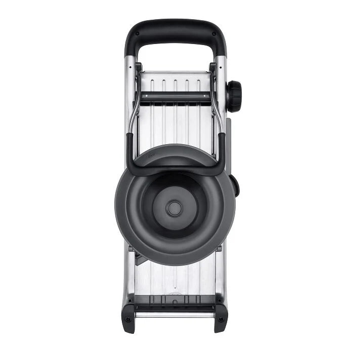 Close-up of the OXO Chef's Steel Mandoline, showcasing its angled Japanese blade and elegant stainless steel design for precision slicing.