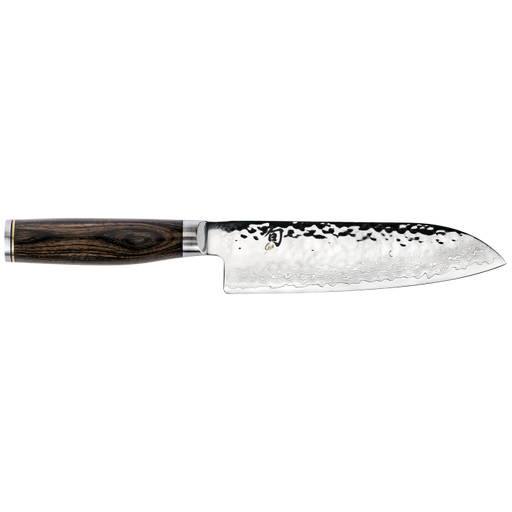 Shun Premier Santoku 7 Walnut knife with hammered tsuchime finish, Damascus layering, Japanese characters, and a dark wooden handle, ideal for versatile kitchen tasks.