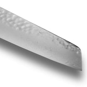 Shun Premier Master Utility Walnut, 6.5 knife with Damascus steel and tsuchime finish, showcasing wavy patterns and hammered dimples for versatile kitchen use.