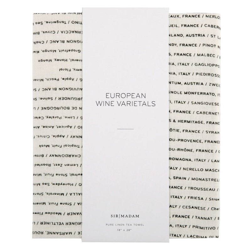 Sir|Madam Linen Tea Towels, Wine Varietals, folded with names of European wine grapes, wrapped in a band reading “EUROPEAN WINE VARIETALS,” ideal for drying delicate kitchenware.