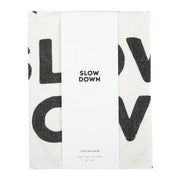 Sir|Madam Linen Tea Towel, Slow Down, features bold black typography on white linen, ideal for drying delicate kitchenware, reflecting Athens Cooks' curated kitchen collection.