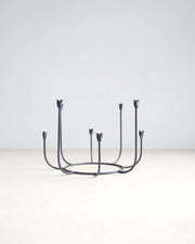 The Floral Society | Beacon Long Stem Candelabra, a wrought iron piece with curved stems and tulip candle cups for eight tapers, inspired by garden gates.