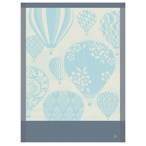 Le Jacquard Français | Cappadoce Tea Towel, Blue, featuring elegant hot-air balloons with decorative patterns, framed in slate-gray, perfect for enhancing any kitchen setting.