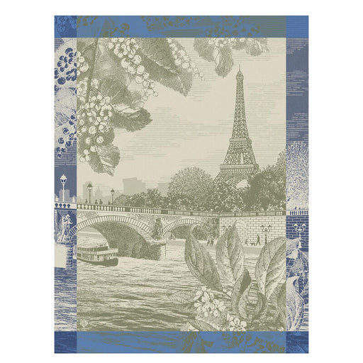 Le Jacquard Francais | Paris Sur Seine Tea Towel, Green: Features an elegant Eiffel Tower and Seine scene with floral details, ideal for adding French charm to your kitchen decor.
