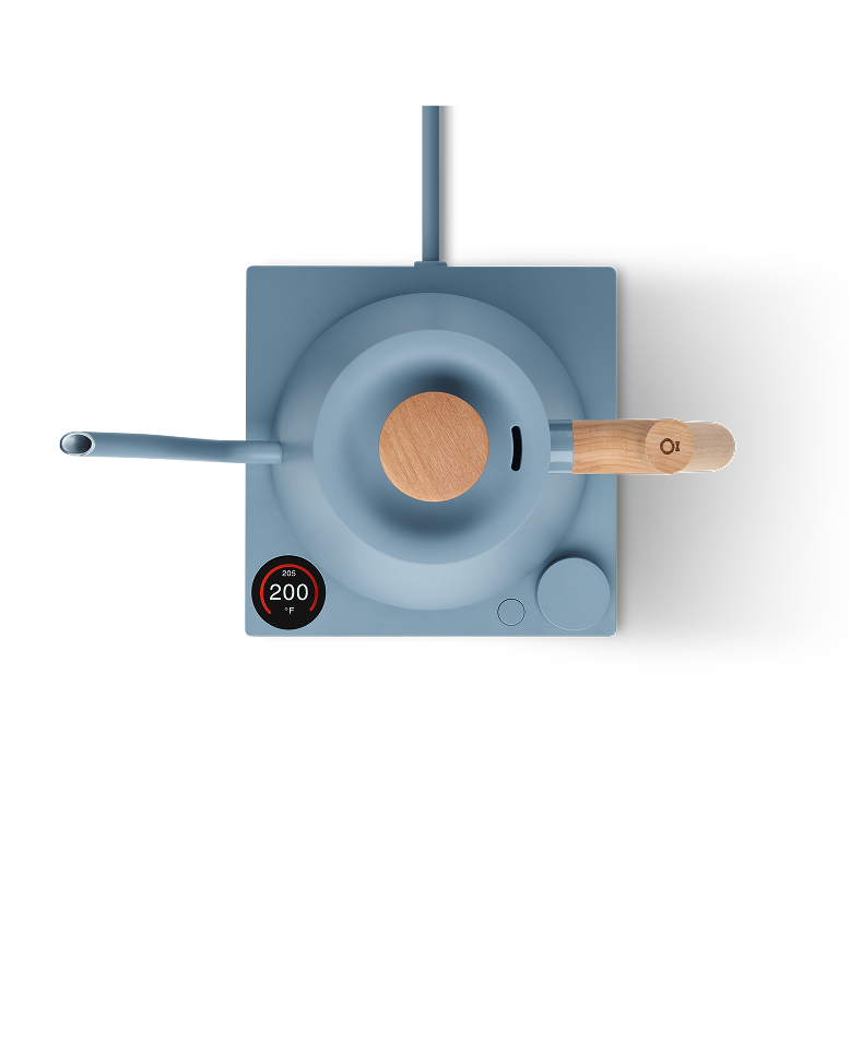FELLOW | Stagg EKG Pro Electric Kettle, Hazy Blue w/ Maple sits on an induction cooktop, displaying 200°F on its control panel, showcasing precision brewing.