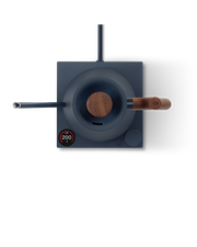 FELLOW | Stagg EKG Pro Electric Kettle with wooden accents on an induction cooktop, displaying 200°F, ideal for precise coffee brewing.
