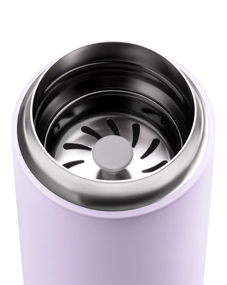 Top view of the FELLOW | Carter Move Mug, Peri Twinkle / 16 oz, showcasing its strainer for tea or fruit infusions, ideal for flavor retention on the go.