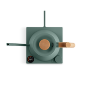 FELLOW | Stagg EKG Pro Electric Kettle in Smoke Green with Maple handle, featuring a digital display and control knob for precision brewing on its base.