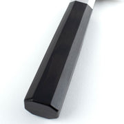 Shun Dual Core Kiritsuke, 8-inch knife with octagonal black handle and white ferrule, showcasing traditional Japanese craftsmanship with a high-performance blade.