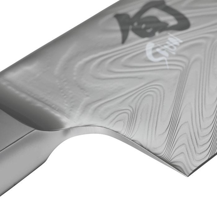 Shun | Dual Core Kiritsuke, 8 inches, showcased in a close-up, features Damascus steel with a distinctive pattern and a traditional handle. Ideal for precise culinary tasks.