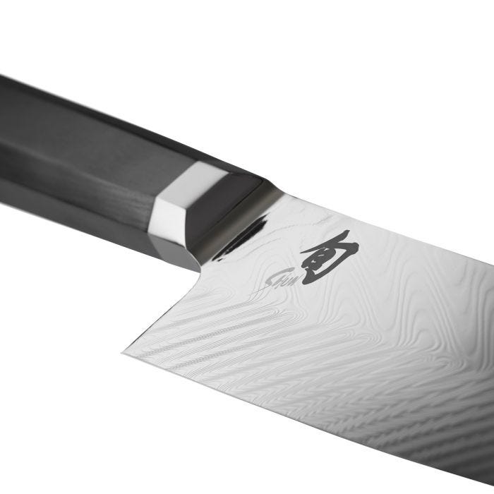 Shun | Dual Core Kiritsuke, 8 inches, showcasing a damascus-style blade, etched kanji logo, and pakkawood handle with bolster, exemplifies craftsmanship and precision.