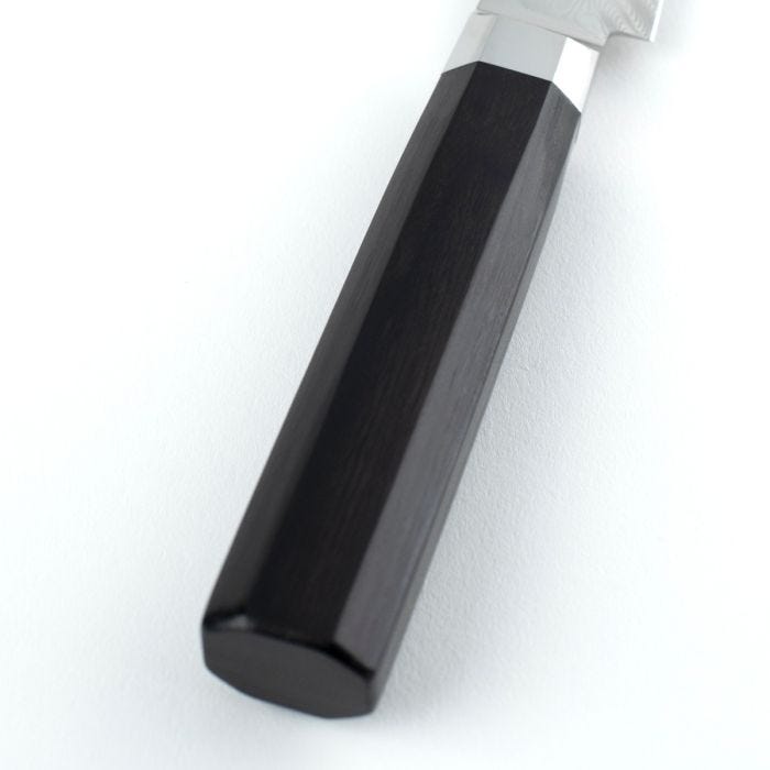 Shun Dual Core Utility & Butchery Knife, 6 inches, featuring an octagonal black wooden handle with a polished metal bolster, perfect for precise kitchen tasks.