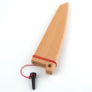 Shun Dual Core Yanagiba, 10.5 inches, with wooden sheath and red cord, showcasing a single-bevel blade for sushi, highlighting its traditional design and craftsmanship.