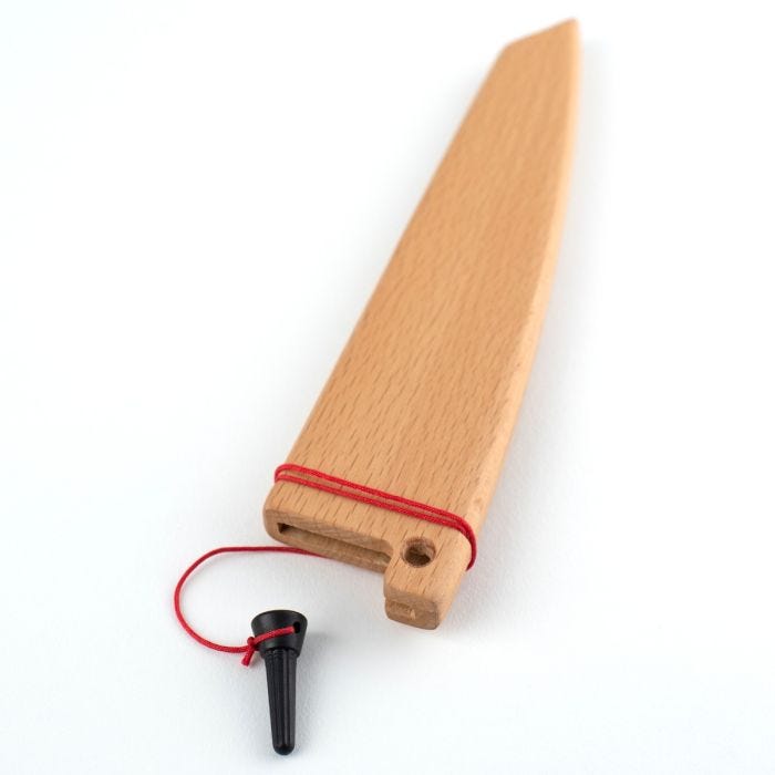 Shun Dual Core Yanagiba, 10.5 inches, with wooden sheath and red cord, showcasing a single-bevel blade for sushi, highlighting its traditional design and craftsmanship.