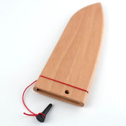 Shun Dual Core Santoku, 7 inches, featuring a wooden saya sheath and octagon-shaped handle, designed for versatile kitchen use, handcrafted with high-carbon stainless steel.