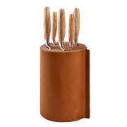 Wusthof | Villa 6-Piece Knife Block Set: Cylindrical, leather-bound block with five knives, featuring light wood-grain handles and stainless-steel blades, designed for stylish, safe storage.