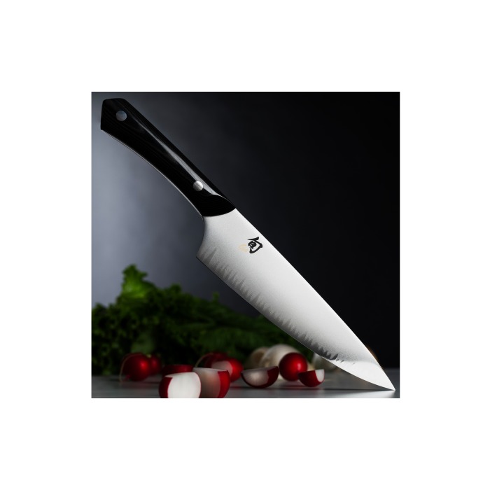 Shun | Narukami 8 Chef's Knife with carbon steel core, showcased over radishes on cutting surface, embodies precision and artistry for culinary enthusiasts.