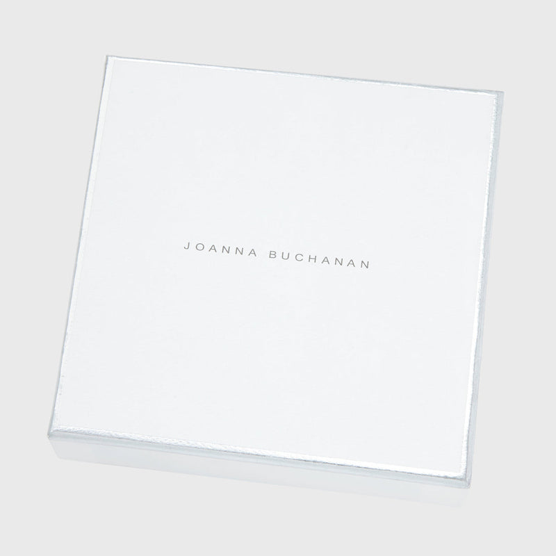 Joanna Buchanan Party Set includes cocktail picks and wine charms, presented in a stylish white box with silver text.