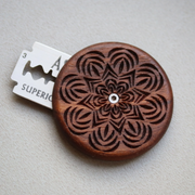 Wire Monkey | UFO Bread Journey Lame: Hand-carved wooden blade holder with floral pattern, retractable DE blade, designed for precision bread scoring.