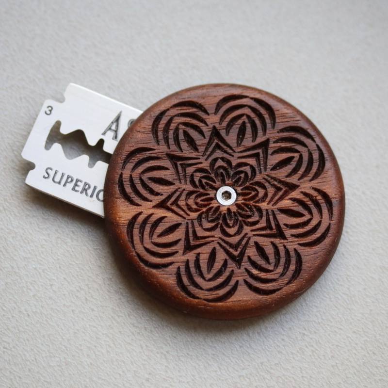 Wire Monkey | UFO Bread Journey Lame: Hand-carved wooden blade holder with floral pattern, retractable DE blade, designed for precision bread scoring.